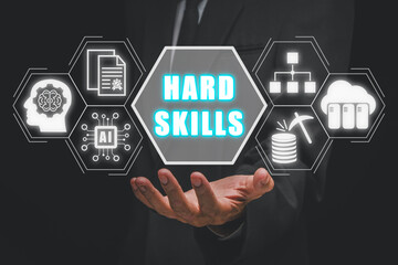 Hard skills concept, Businessman hand holding hard skills on virtual screen. - obrazy, fototapety, plakaty