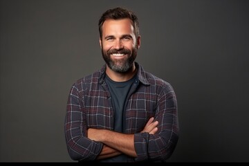 Portrait of a handsome man smiling with arms crossed over grey background - obrazy, fototapety, plakaty