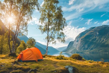 Fototapeta na wymiar Idyllic camping scene set against a breathtaking mountain landscape Encapsulating the essence of adventure and the great outdoors