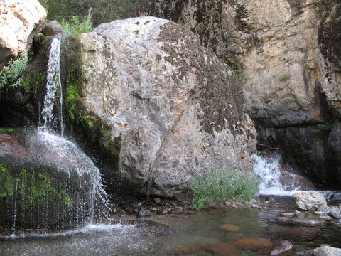 waterfall between stone