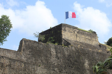 French flag flying over Fort Saint Louis in Fort-de-France, Martinique