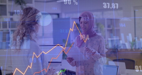 Image of financial data processing over diverse business people in office