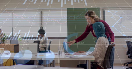 Image of financial data processing over diverse business people in office