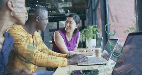 Image of financial data processing over diverse businesspeople using laptops in office