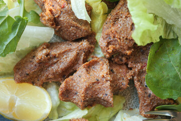 Raw meatballs or cig kofte. Traditional Turkish cuisine delicacies.