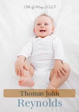 Composition of thomas john reynolds text with birth date over caucasian baby on white background