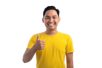 Smiling handsome Asian man showing thumbs up with hand isolated on white background