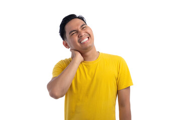 Tired handsome Asian man touching neck with pain expression isolated on white background