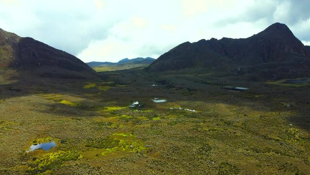 As the drone soars gracefully above the rugged terrain, you'll be treated to sweeping vistas of rolling hills, expansive moors, and crystal-clear lakes that shimmer like jewels in the sunlight..