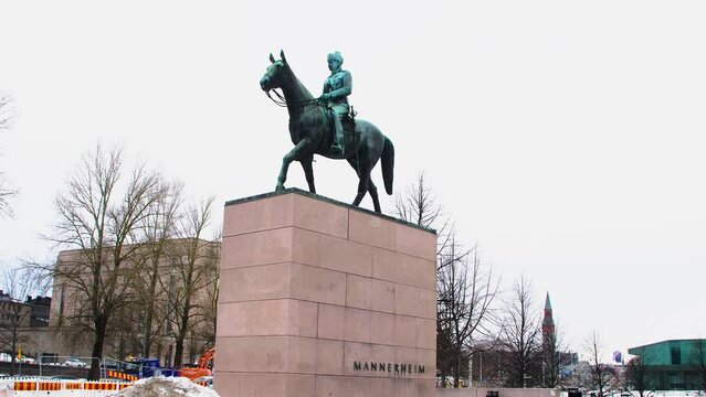 Equestrian statue of Mannerheim against cloudy sky in Helsinki