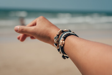 Sea bracelet on the wrist at the beach