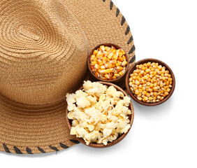 Bowls of corn and straw hat on white background. Festa Junina (June Festival) celebration