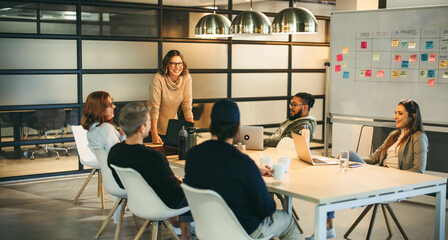 Creative business team: Boardroom brainstorming with a scrum master - 748460691