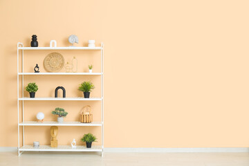 Modern shelf unit near beige wall