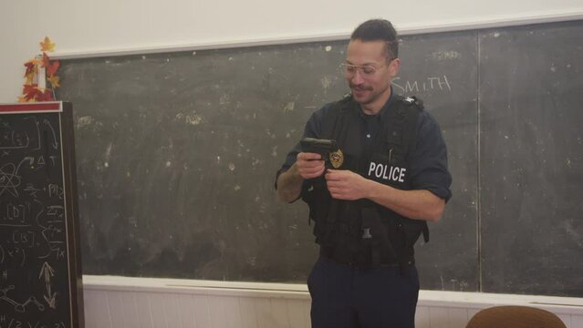Police officer teaching gun safety