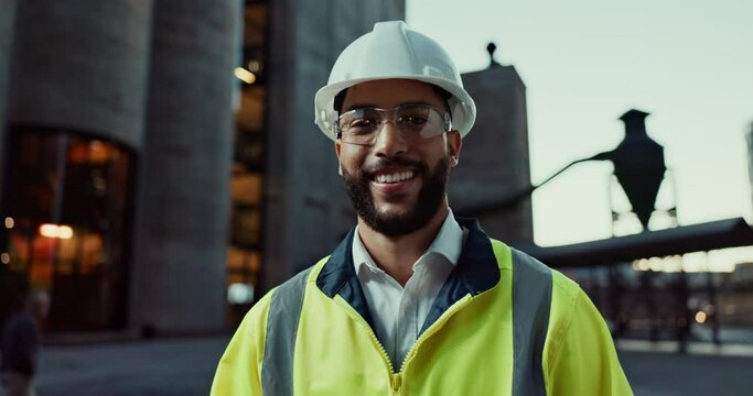 Engineering, man and face with confidence in safety helmet, vest and civil engineer for construction in city. Portrait, happy or professional contractor at night or pride in work on urban development
