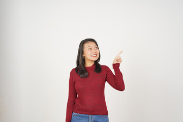 Young Asian woman in Red t-shirt pointing side copy space  isolated on white background