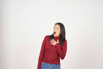 Young Asian woman in Red t-shirt doing Wow or Shock face and looking aside isolated on white background