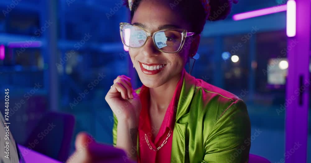 Leinwandbilder Woman, night and smile in office with neon, tablet and glasses for reading, information technology or coding. Person, girl and developer with click for programming, excited and creative for software
