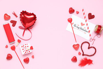 Composition with greeting card, gift box and different decor for Valentine's Day celebration on...