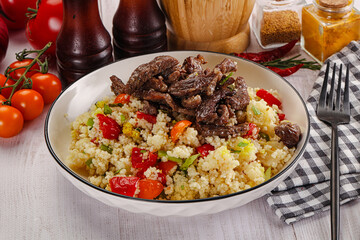 Traditional couscous with beef and vegetables