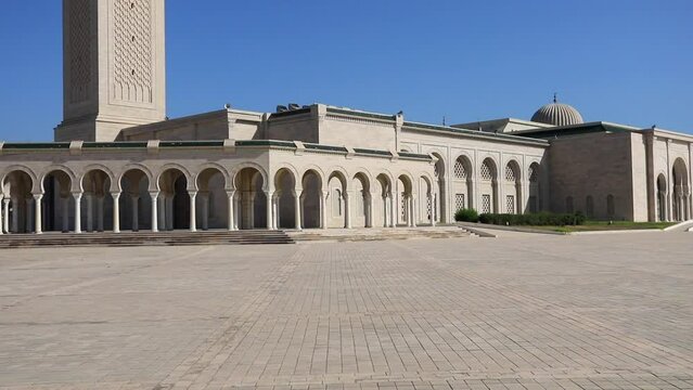Bright sunny day at the grand Mosque Malik ibn Anas in Carthage, Tunisia with clear blue sky