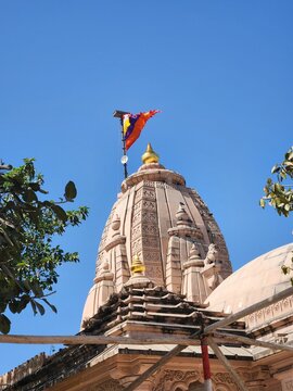 Somnath, Gujarat India - Feb 22 2024: Bhalka Tirth Temple - Intricately carved temple with a peepal tree associated with Krishna, on a famed pilgrimage route.