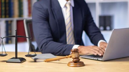 A judge gavel is prepared in the courtroom to be used to give a signal when the verdict is read after the trial is completed. Concept judge gavel is prepared to symbolize the decision in a court case.