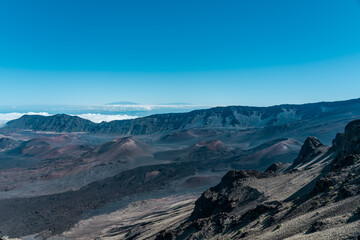 Fototapeta na wymiar Cinder cone at Haleakala crater or the East Maui Volcano, is a massive, active shield volcano that forms more than 75% of the Hawaiian Island of Maui.