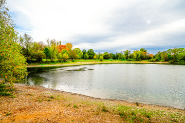 Dietenbachsee near Freiburg im Breisgau with the surrounding nature. Autumn landscape by the lake.
