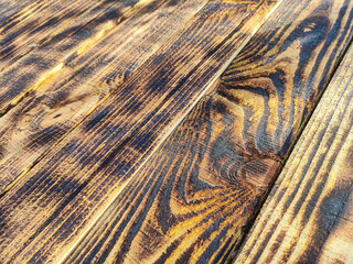 wood texture. burnt wood. wood fibers. beautiful boards. abstract white background.