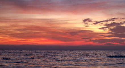 Sunset Clouds background. Dramatic Clouds Sunset Background. Sky with clouds in Sunrise. Sunrise with clouds in various shapes background. Calm Cloud.