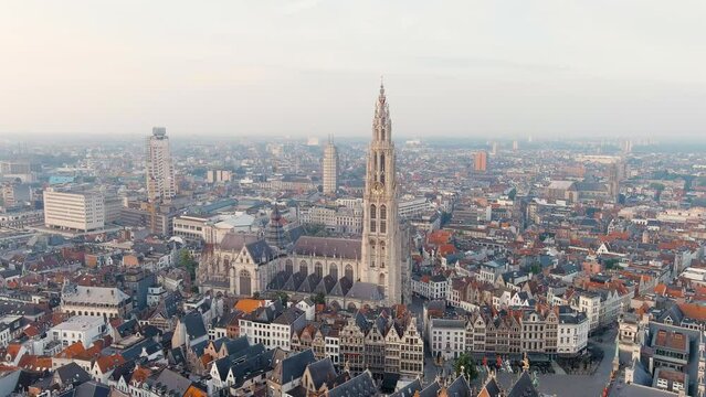 Antwerp, Belgium. Spire with the clock of the Cathedral of Our Lady (Antwerp). Historical center of Antwerp. City is located on river Scheldt (Escaut). Summer morning, Aerial View, Point of interest