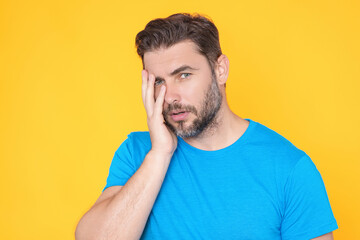 Portrait of thinking man with confused puzzled face on studio isolated background. Man thinking, pensive expression, thoughtful face. Doubt concept. Serious expression, doubting and choice.