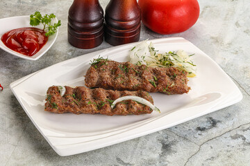 Kebab with beef served onion