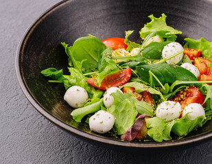 Caprese salad with tomato, mozzarella and basil