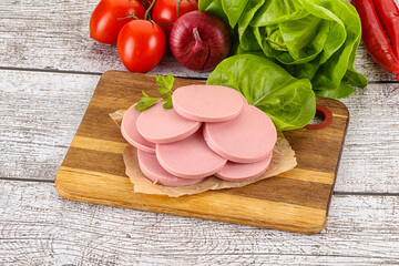 Slices boiled sausages for breakfast