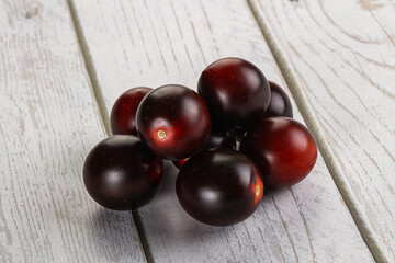 Raw ripe black kumato tomato