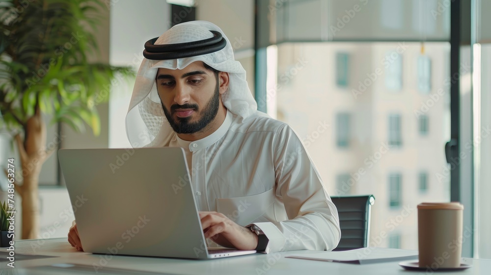 Poster businessman working at his desk with laptop computer, checking email, taking part in online meetings