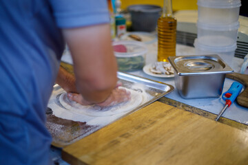 Delicious Italian Pizza being Prepared by Gourmet Chef