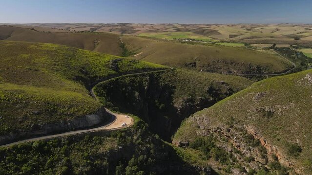 Road along the seweweekspoort pass though the green canyon before the desert appear at the other side of the mountains