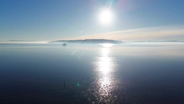 Sunrise over the sea. Icy waters during winter. 