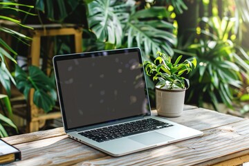 Modern laptop computer on a rustic wooden table, suitable for technology or workspace concepts
