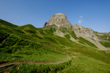 hikers descending into the valley, Col de Souzon, Midi d'Ossau peak, 2884 meters, Pyrenees National...