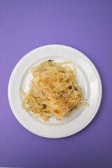 Traditional portuguese cousine, cod fish onions with oil.