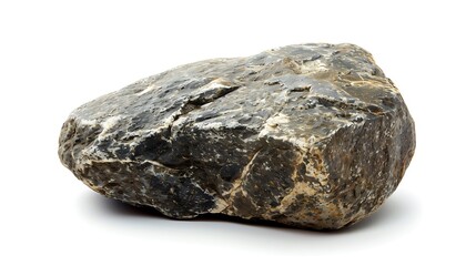 Large, dark gray rock with white and brown spots isolated on white background. The rock is angular and has a rough surface.