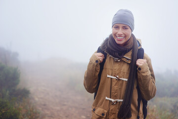 Happy woman, hiking and portrait in nature, winter and morning fitness for travel in environment. Healthy, person or positive face for outdoor exercise, strong or walking for trip in sweden mountain