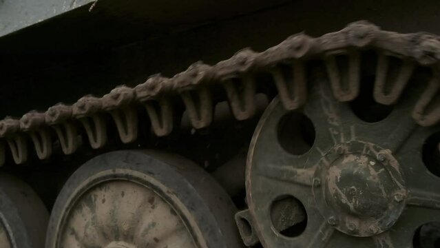a military armored vehicle on tracks is moving through the swamp. war in Ukraine. mtlb, bmp