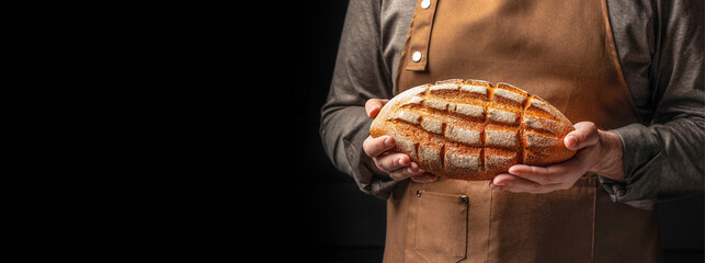 male baker holds homemade Corn Bread, banner, menu, recipe place for text, top view