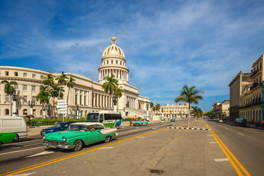 October 28, 2019: vintage car and National Capitol Building, a public edifice and one of the most visited sites  in havana, cuba. It was built from 1926 to 1929 by cuban president Gerardo Machado